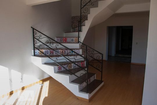 Sala de casa de condomínio à venda com 3 quartos, 250m² em Santo Antônio, Porto Alegre