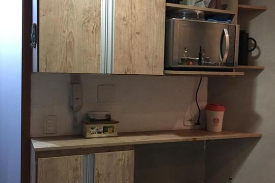 Cozinha de apartamento à venda com 2 quartos, 57m² em Vila Paulista, São Paulo
