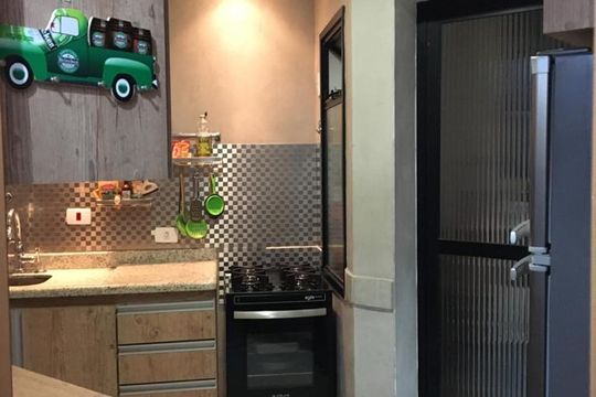 Cozinha de apartamento à venda com 2 quartos, 57m² em Vila Paulista, São Paulo