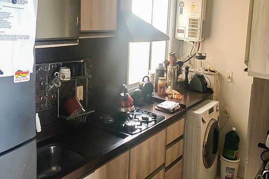 Cozinha de apartamento à venda com 3 quartos, 75m² em Humaitá, Porto Alegre