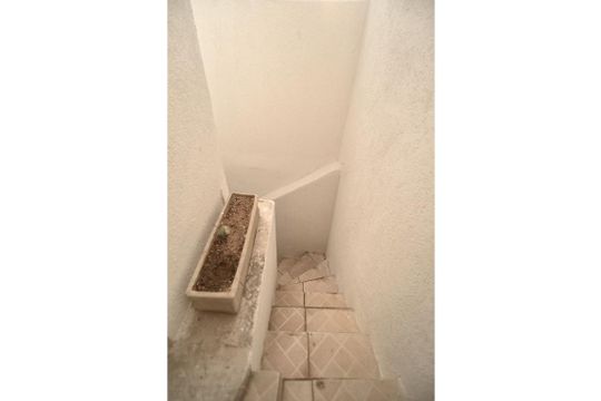 Escada para o sub-solo de casa para alugar com 3 quartos, 76m² em Vila Regente Feijó, São Paulo