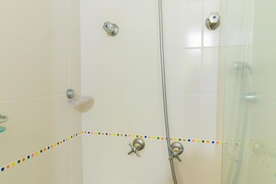 Suíte - Banheiro  de apartamento à venda com 1 quarto, 30m² em Jardim Paulista, São Paulo