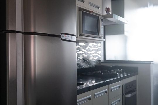 Cozinha de apartamento à venda com 2 quartos, 60m² em Vila Bertioga, São Paulo