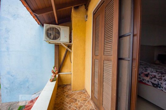 varanda quarto 2 de casa de condomínio à venda com 3 quartos, 200m² em Sarandi, Porto Alegre