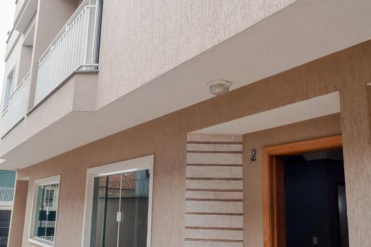 Fachada de casa de condomínio à venda com 3 quartos, 90m² em Penha de França, São Paulo
