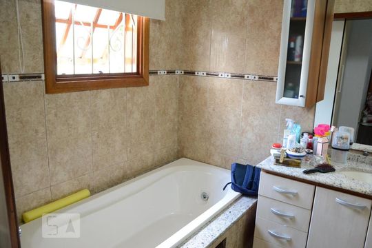 Banheiro da Suíte de casa à venda com 3 quartos, 110m² em Estância Velha, Canoas