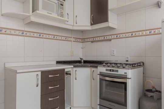Cozinha de apartamento à venda com 1 quarto, 42m² em Auxiliadora, Porto Alegre