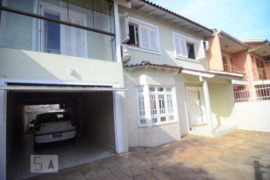 Fachada de casa à venda com 4 quartos, 250m² em Estância Velha, Canoas