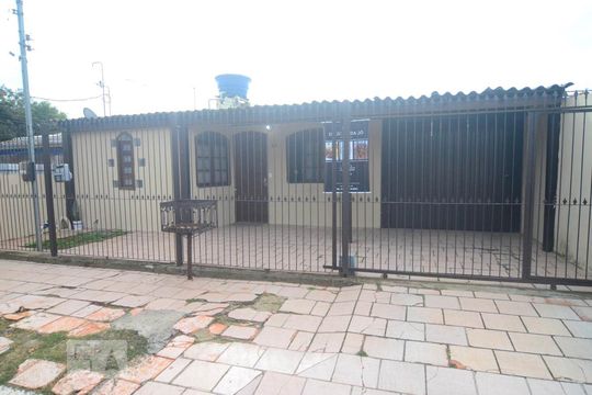 Fachada de casa à venda com 3 quartos, 300m² em Guajuviras, Canoas