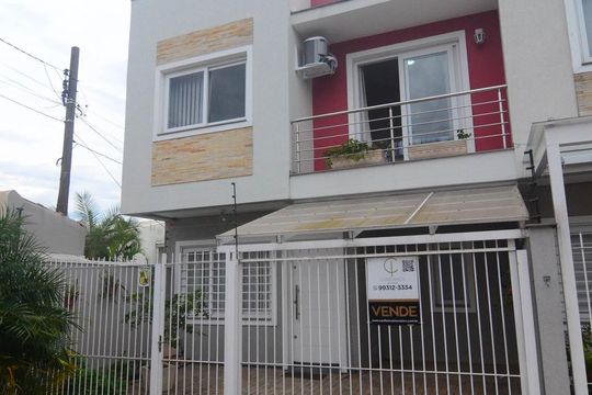 Fachada de casa à venda com 3 quartos, 90m² em Niterói, Canoas