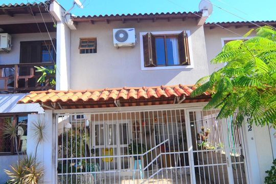 Fachada de casa à venda com 2 quartos, 70m² em Harmonia, Canoas