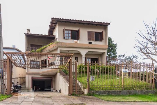 Fachada de casa à venda com 4 quartos, 460m² em Santa Tereza, Porto Alegre
