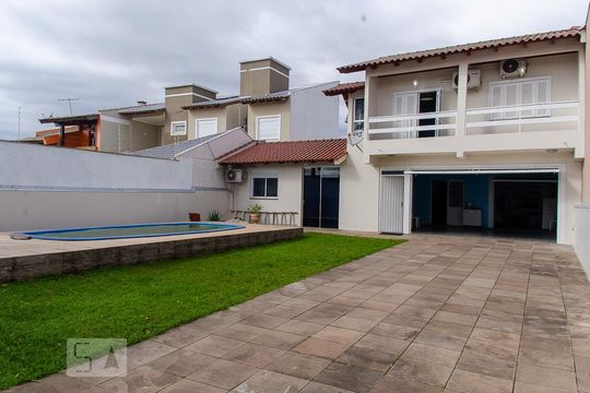 Fachada de casa à venda com 3 quartos, 150m² em Rio Branco, Canoas