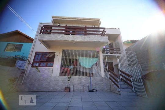 Fachada fundos de casa à venda com 4 quartos, 300m² em Jardim Itu-sabará, Porto Alegre