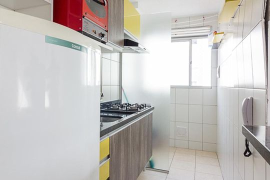 Cozinha e Área de Serviço de apartamento à venda com 2 quartos, 54m² em Rubem Berta, Porto Alegre