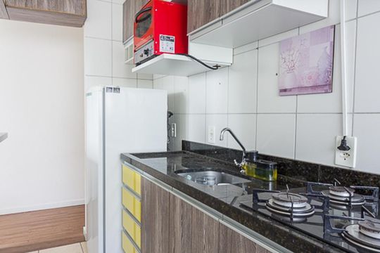 Cozinha e Área de Serviço de apartamento à venda com 2 quartos, 54m² em Rubem Berta, Porto Alegre