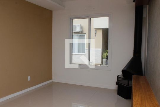 Sala de casa de condomínio à venda com 3 quartos, 140m² em Ipanema, Porto Alegre