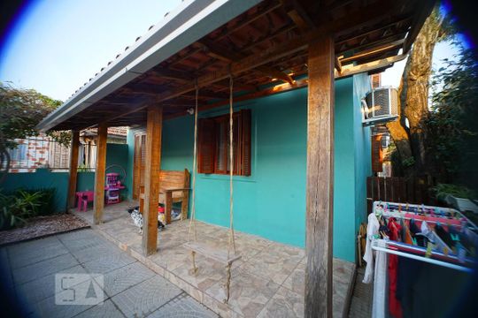 Frente da casa de casa à venda com 4 quartos, 120m² em Humaitá, Porto Alegre