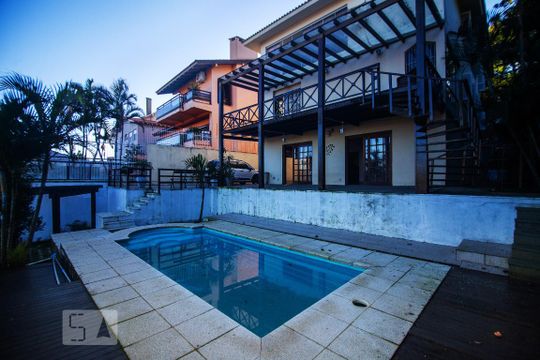 2_AREA EXTERNA PISCINA de casa à venda com 4 quartos, 394m² em Vila Assunção, Porto Alegre