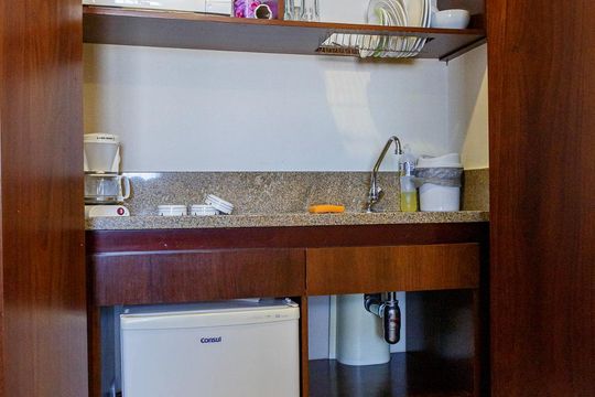 Cozinha de apartamento à venda com 1 quarto, 27m² em Jardim Paulista, São Paulo