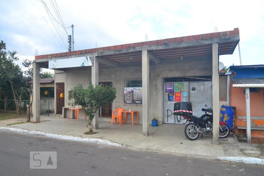 Fachada de casa à venda com 3 quartos, 80m² em Harmonia, Canoas