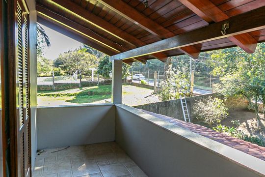 Varanda do Quarto de casa à venda com 5 quartos, 320m² em Vila Nova, Porto Alegre