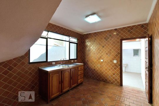 Cozinha de casa de condomínio para alugar com 2 quartos, 110m² em Jardim Monte Kemel, São Paulo