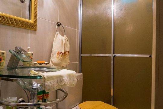 Banheiro da Suíte 1 de casa à venda com 3 quartos, 340m² em Vila Nova, Porto Alegre
