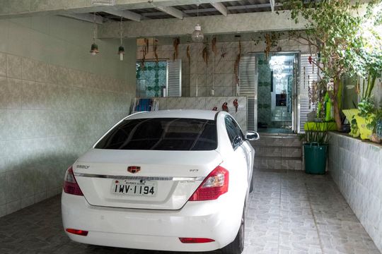 Garagem de casa à venda com 3 quartos, 340m² em Vila Nova, Porto Alegre