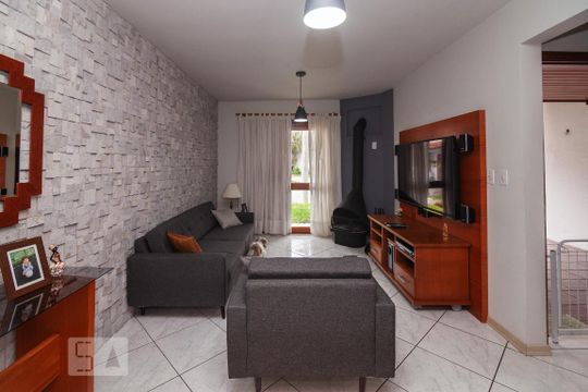 Sala de casa de condomínio à venda com 3 quartos, 183m² em Vila Nova, Porto Alegre