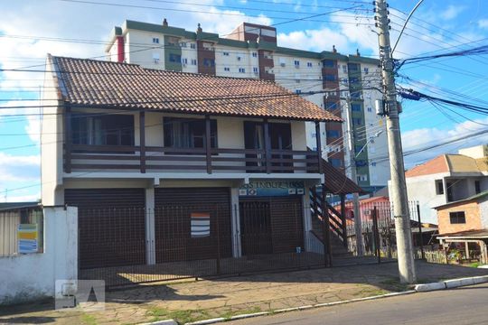 Fachada de casa à venda com 3 quartos, 100m² em Marechal Rondon, Canoas