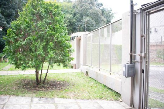 Garagem de casa de condomínio à venda com 4 quartos, 213m² em Vila Nova, Porto Alegre