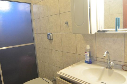 Banheiro de casa à venda com 5 quartos, 176m² em Niterói, Canoas