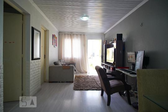 Sala de casa de condomínio à venda com 2 quartos, 68m² em Mato Grande, Canoas