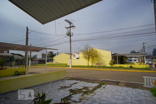 Sala - Vista de casa de condomínio à venda com 2 quartos, 68m² em Mato Grande, Canoas