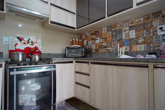 Cozinha de casa de condomínio à venda com 2 quartos, 68m² em Mato Grande, Canoas