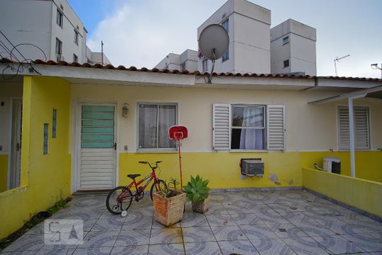 Fachada da Casa de casa de condomínio à venda com 2 quartos, 68m² em Mato Grande, Canoas
