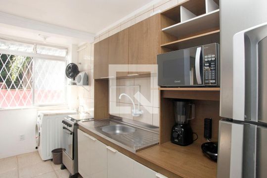 Cozinha + Área de Serviço de kitnet/studio à venda com 1 quarto, 32m² em Jardim Botânico, Porto Alegre