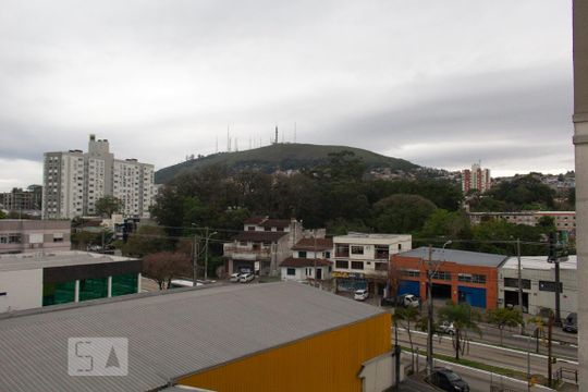 Sala - Vista de apartamento à venda com 2 quartos, 43m² em Coronel Aparicio Borges, Porto Alegre