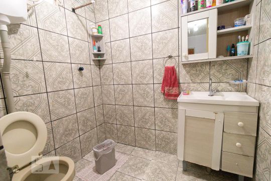 Suíte 1 de casa à venda com 4 quartos, 150m² em Olaria, Canoas