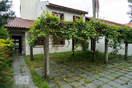 Fachada de casa à venda com 3 quartos, 220m² em Ipanema, Porto Alegre