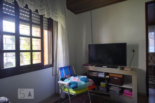 Quarto 1 de casa à venda com 3 quartos, 150m² em Santa Maria Goretti, Porto Alegre