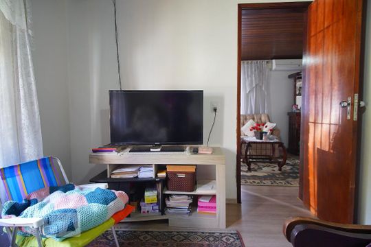 Quarto 1 de casa à venda com 3 quartos, 150m² em Santa Maria Goretti, Porto Alegre