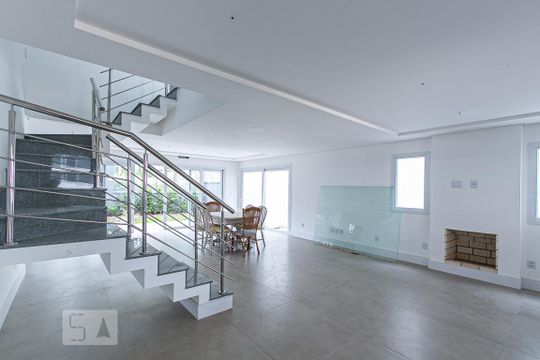 Sala de casa de condomínio à venda com 3 quartos, 524m² em Pedra Redonda, Porto Alegre