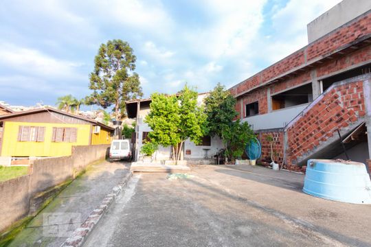 Fachada de casa à venda com 3 quartos, 175m² em Rondônia, Novo Hamburgo