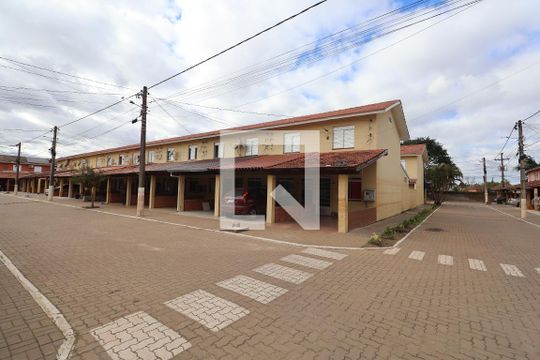 Fachada de casa de condomínio para alugar com 2 quartos, 70m² em Rio Branco, Canoas