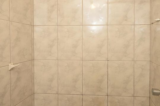 Banheiro de kitnet/studio para alugar com 1 quarto, 35m² em Sampaio, Rio de Janeiro