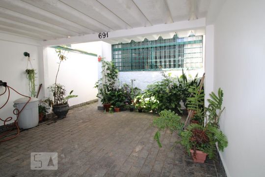 Garagem e fachada de casa à venda com 3 quartos, 150m² em Brooklin, São Paulo