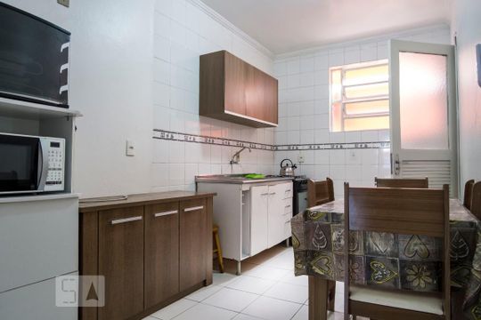 Cozinha de apartamento à venda com 1 quarto, 50m² em Medianeira, Porto Alegre