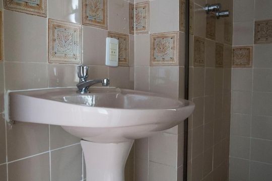 Banheiro de apartamento para alugar com 1 quarto, 52m² em Rio Branco, Porto Alegre